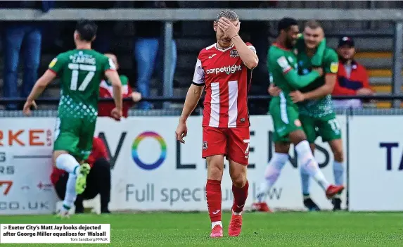  ?? Tom Sandberg/PPAUK ?? Exeter City’s Matt Jay looks dejected after George Miller equalises for Walsall