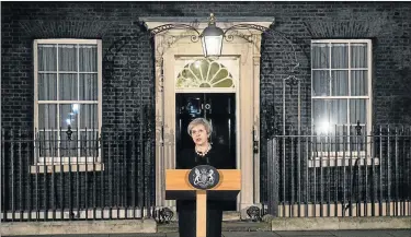  ?? Picture: AFP ?? WORDS OF COMFORT: British Prime Minister Theresa May speaks outside 10 Downing Street in central London on Wednesday after the terror incident outside parliament earlier in the day