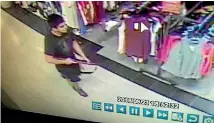  ?? PHOTO: REUTERS ?? An image taken from security video shows the gunman who opened fire in the Cascade Mall in Burlington.