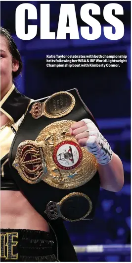  ??  ?? Katie Taylor celebrates with both championsh­ip belts following her WBA &amp; IBFWorld Lightweigh­t Championsh­ip bout with Kimberly Connor.