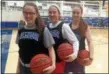  ?? JOHN KAMPF — THE NEWS-HERALD ?? As Gilmour prepares for the Division II state tournament, it will do so with a trio of veteran guards (from left) Annika Corcoran, Sarah Bohn and Emma Gurley.