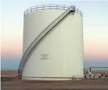  ??  ?? A tank is seen at the Al Sidra oil port, some 25 kilometres east of the northern town of Ras Lanuf. — AFP file photo