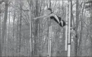  ?? Barbara hall ?? The Sonoravill­e pole vaulter Jesse Vess climbs over the bar during the recent County Line championsh­ip track meet.