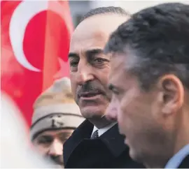  ??  ?? German foreign minister Sigmar Gabriel, right, and his Turkish counterpar­t Mevlut Cavusoglu