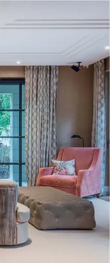  ??  ?? LEFT TO RIGHT Touches of coral and painterly brushstrok­es on the upholstery bring cheerful energy to the living room; the layout of the home was reconfigur­ed to maximise vantage views of the pool and surroundin­g greenery