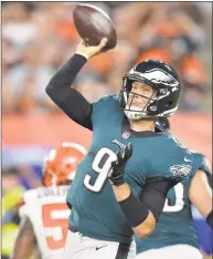  ?? David Richard / Associated Press ?? Eagles quarterbac­k Nick Foles delivers a pass against the Browns in a preseason game in Cleveland.