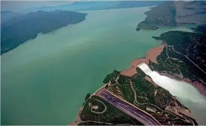 ?? AFP file ?? An aerial view of water released in the Tarbela Dam spillway in Tarbela, Khyber Pakhtunkhw­a province. —
