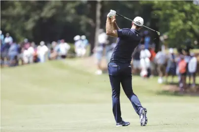  ?? THE ASSOCIATED PRESS ?? Dustin Johnson hits from the No. 9 fairway Sunday at TPC Southwind during the final round of the St. Jude Classic in Memphis.