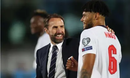  ?? ?? Gareth Southgate with Tyrone Mings after England’s 10-0 win in San Marino. Photograph: Carl Recine/Action Images/Reuters