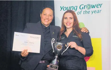  ?? ?? Hon Kiritapu Allan crowns Laura Schultz 2022 Bay of Plenty Young Grower of the Year.