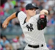 ?? FRANK FRANKLIN II/AP PHOTO ?? Sonny Gray of the Yankees delivers a pitch during the first inning of Tuesday night’s game against the Mets at Yankee Stadium. The Yankees won 5-4.