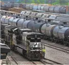  ?? GENE J. PUSKAR/AP ?? Railroads argue that the industry’s overall safety record has been improving even as trains have grown longer and crew sizes shrank over the decades.