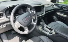  ??  ?? The 2018 GMC Acadia Denali interior leaves much to be desired.