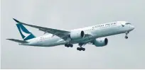  ?? (Tim Chong/Reuters) ?? A CATHAY PACIFIC A350 that is part of the project.
