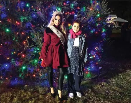  ?? SUBMITTED PHOTO ?? The tree lighting ceremony concluded Christmas in Birdsboro with Ms. Pennsylvan­ia 2022Briann­e Houck, of Birdsboro, officially lighting the tree.