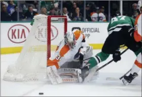  ?? MICHAEL AINSWORTH — THE ASSOCIATED PRESS ?? Despite Brian Elliott returning to practice Saturday in the long recovery from “core muscle” surgery, Flyers goalie Petr Mrazek, seen in Tuesday’s game against Dallas, will likely start again Sunday when Boston visits.