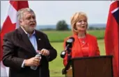  ??  ?? Ted McMeekin and Judi Partridge announced Friday at Dyment’s market in Flamboroug­h they will run for Liberals.