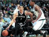  ?? IC ?? Brooklyn Nets guard Jeremy Lin drives to basket past Boston Celtics’ Jordan Mickey in NBA game at TD Garden in Boston on Oct 17. Lin is giving $1 million to his alma mater, Harvard.