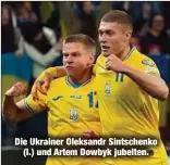  ?? ?? Die Ukrainer Oleksandr Sintschenk­o (l.) und Artem Dowbyk jubelten.