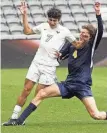  ?? LORRIE CECIL/THISWEEK ?? New Albany's Gabe Anthony and Cleveland St. Ignatius' Owen Maruca battle during the Division I state final Nov. 12.