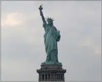  ?? KATHY WILLENS – THE ASSOCIATED PRESS ?? The Statue of Liberty portrays a beacon of freedom and hope.