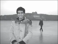  ?? PROVIDED TO CHINA DAILY ?? Ahmed Mohammed, who runs a blockchain-technology company at Zhongguanc­un Science Park in Beijing, poses at the Summer Palace.