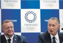  ?? EUGENE HOSHIKO THE ASSOCIATED PRESS ?? John Coates, left, chair an IOC inspection team, says preparatio­ns for the 2020 Tokyo Games are going smoothly. With him at a news conference Thursday is Tokyo Olympic organizing committee president Yoshiro Mori.