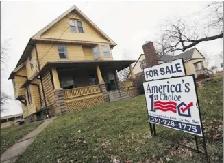  ?? Shannon Stapleton, Reuters ?? U.S. analysts say aspiring Donald Trumps are buying up houses at bargain basement prices and turning them into rentals. As one investor notes: “We’re at the bottom . . . where else is there to go but up?”