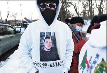  ?? Arnold Gold / Hearst Connecticu­t Media ?? Angel Rodriguez’s uncle, Manuel Arce, of New Haven, is joined by friends and family for a vigil to mourn Rodriguez on Orange Street in New Haven on Saturday, near where his body was found in East Rock Park.