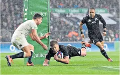  ??  ?? Slings and arrows: Chris Ashton dives over the line to give England the perfect start (left); the England pack rumble over to give Dylan Hartley a try (top); Damian McKenzie plunges over by the posts after a well-worked All Black move from a scrum (above); Courtney Lawes charges down TJ Perenara’s kick (right) but was ruled offside