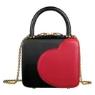  ??  ?? Bag By Chlöe Sevigny, Chopard, ppv; chopard.com.