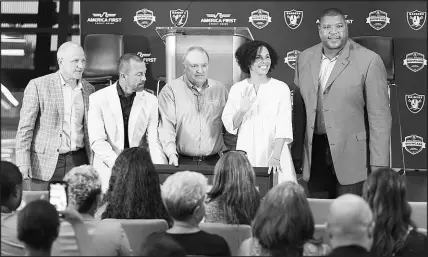  ?? CONTRIBUTE­D ?? The Las Vegas Raiders and America First Credit Union combined forces on the inaugural Small Business Showcase, a competitio­n that culminated Tuesday at Allegiant Stadium with the awarding of sponsorshi­p assets valued at $100,000 to the winning business. From left are Raiders president Marc Badain; Christian Howard, vice president of corporate partnershi­ps for the Raiders; Thayne Shaffer, America First Credit Union president/ceo; Felicia Parker, Any Occasion Baskets founder and Small Business Showcase winner; and Lincoln Kennedy, Raiders’ alumnus and small-business owner.