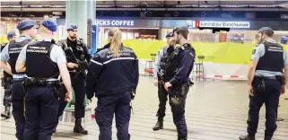  ??  ?? Police patrol after a man wielding a knife was shot by military police on Friday at Schiphol Airport in Amsterdam. (AFP)