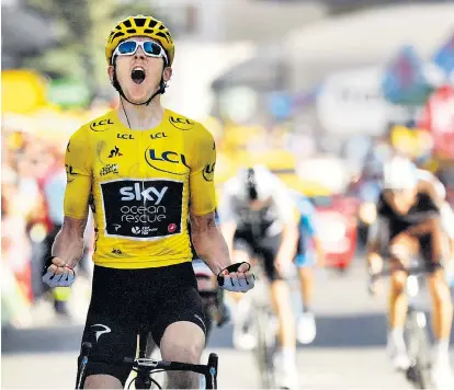  ??  ?? Die letzte Attacke hat gesessen: Geraint Thomas bringt das Gelbe Trikot als Tagessiege­r ins Ziel.