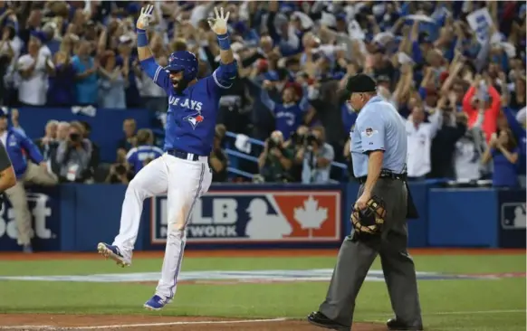  ?? STEVE RUSSELL/TORONTO STAR ?? Toronto Blue Jays right fielder Jose Bautista hit the game- and series-winning home run in the seventh inning, after Texas had taken the lead on one of the strangest plays of the post-season.