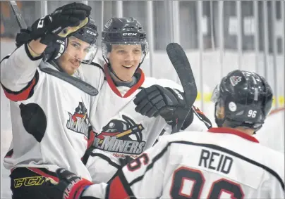  ?? T.J. COLELLO/CAPE BRETON POST ?? From left, Mitchell Johnston, Brody McCarron and Daniel Reid celebrate Johnston’s goal in the first period of play at the 2018 Don Johnson Memorial Cup Atlantic junior ‘B’ hockey championsh­ip Thursday at the Membertou Sport and Wellness Centre....