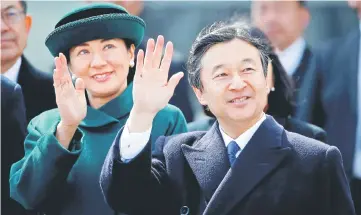 ?? — Reuters photo ?? File photo shows Prince Naruhito (right) and and his wife Crown Princess Masako wave as they send off Emperor Akihito and Empress Michiko boarding a special flight for their visit to Vietnam and Thailand, at Haneda Airport in Tokyo, Japan.