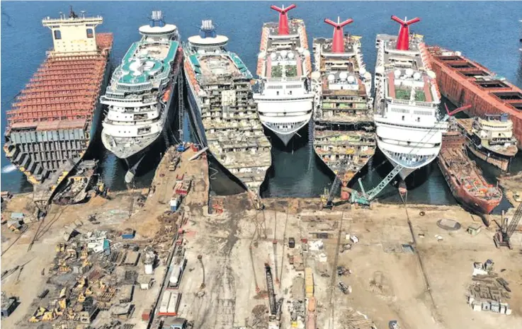  ??  ?? Decommissi­oned cruise ships being dismantled at Aliaga ship-breaking yard in the Aegean port city of Izmir.