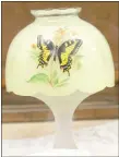 ?? Keith Bryant/The Weekly Vista ?? A fairy lamp displayed at the Bella Vista Historical Museum, bearing a painted butterfly.