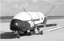  ?? COURTESY OF U.S. AIR FORCE ?? SpaceX and the Air Force prepare to launch the X-37B robotic space plane to perform unspecifie­d technology tests in orbit and then autonomous­ly land on a California runway.