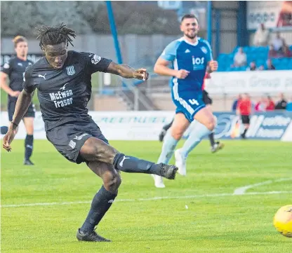  ?? Pictures: SNS Group. ?? The goals that won the game for Dundee. Above: Jean Mendy fires in the clinching second goal in stoppage time; below: Karl Madianga opens the scoring for the Dark Blues with a fierce shot.