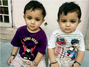  ??  ?? Delhi’s ‘Momo twins’ who turned one this Diwali. —