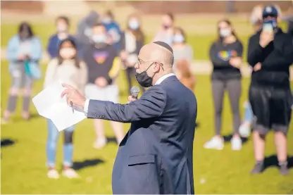  ?? MARKMIRKO/HARTFORD COURANT ?? David Waren, president of the Jewish Federation of Greater Hartford, speaks during a show of solidarity organized by UConn Hillel in response to a recent uptick in anti-Semitic events on campus.