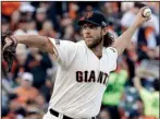  ?? AP/DAVID J. PHILLIP ?? San Francisco pitcher Madison Bumgarner