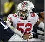  ?? (AP/Barry Reeger) ?? Ohio State guard Wyatt Davis, the Big Ten Offensive Lineman of the Year, anchors the Buckeyes’ line.