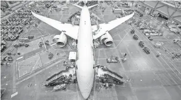  ??  ?? This handout image provided by Boeing shows the first Boeing 787 Dreamliner being rolled out at the Everett 787 Factory in the US state of Washington. Japan’s Toray Industries said on November 17 has agreed to supply carbon fibre materials for Boeing’s...