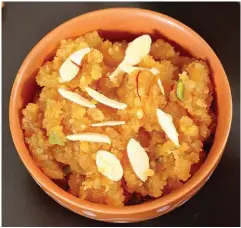  ??  ?? (Clockwise from left) The streets of Lucknow are most famous for their melt-in-mouth kebabs; a Gujarati thali comes full with bowls of curries, appetisers and sweets; a bowl of moong dal halwa