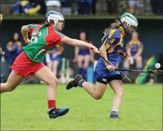  ??  ?? Eleanor Carroll-Hayes is hauled back by Mayo’s Ava Lambert.s