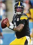  ?? Jacob Kupferman / Associated Press ?? Pittsburgh Steelers quarterbac­k Dwayne Haskins plays against the Carolina Panthers during the preseason in August. Haskins was killed in an auto accident Saturday in Florida.