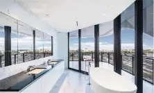  ?? Courtesy of Levy ?? The bathroom of Nicky Jam’s new apartment has an amazing view and a minimalist design.